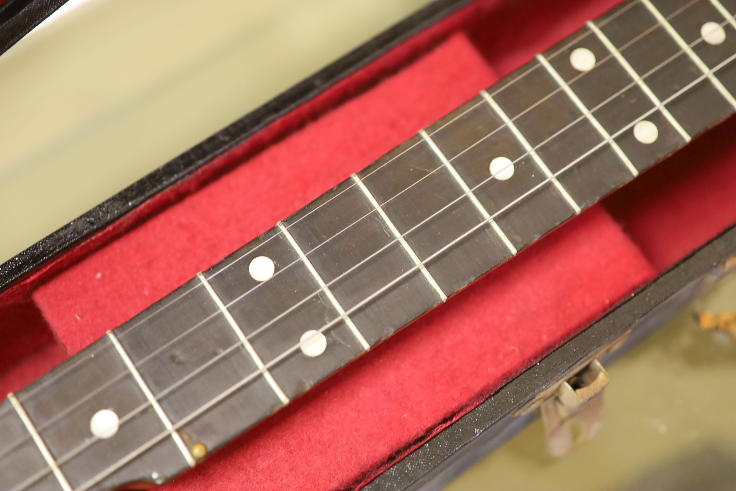 A Windsor popular 4 string banjo, cased